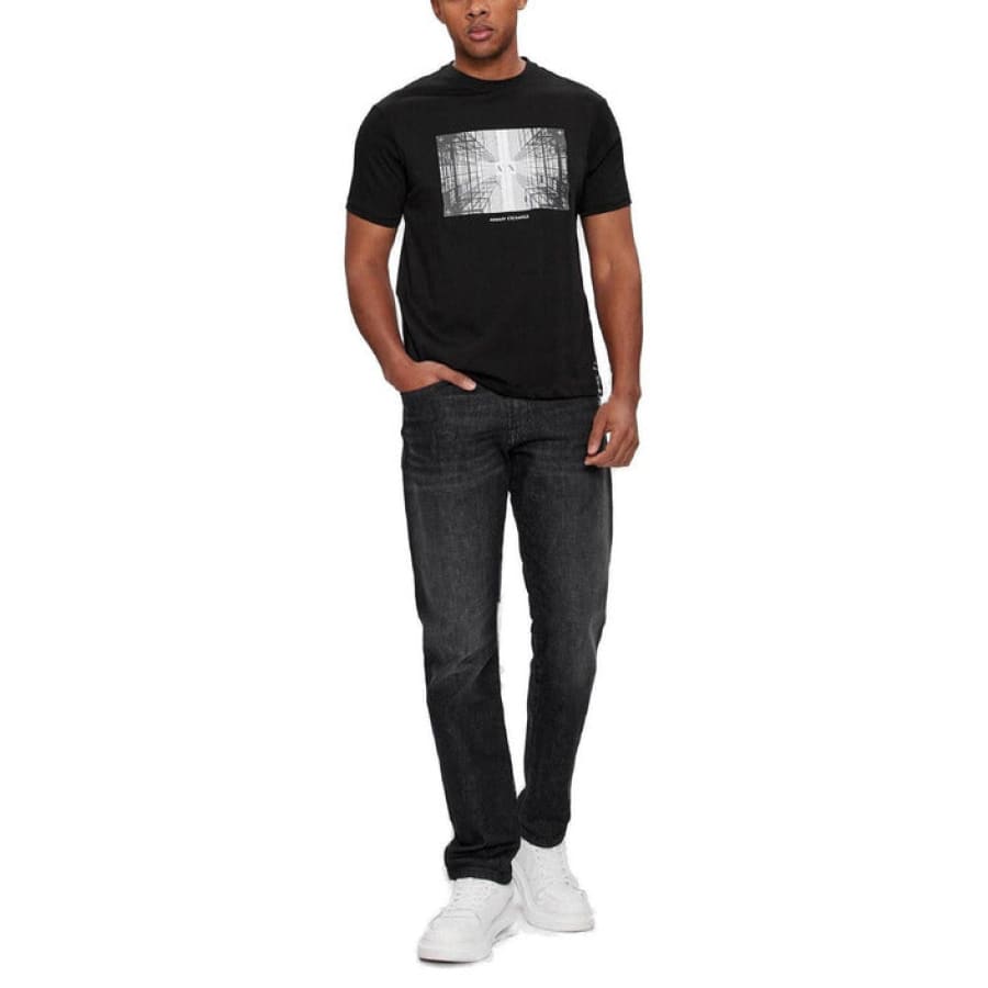 Armani Exchange men’s t-shirt modeled by man in jeans