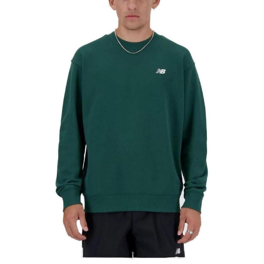 Green The North Face crew neck sweatshirt illustrating urban city style fashion