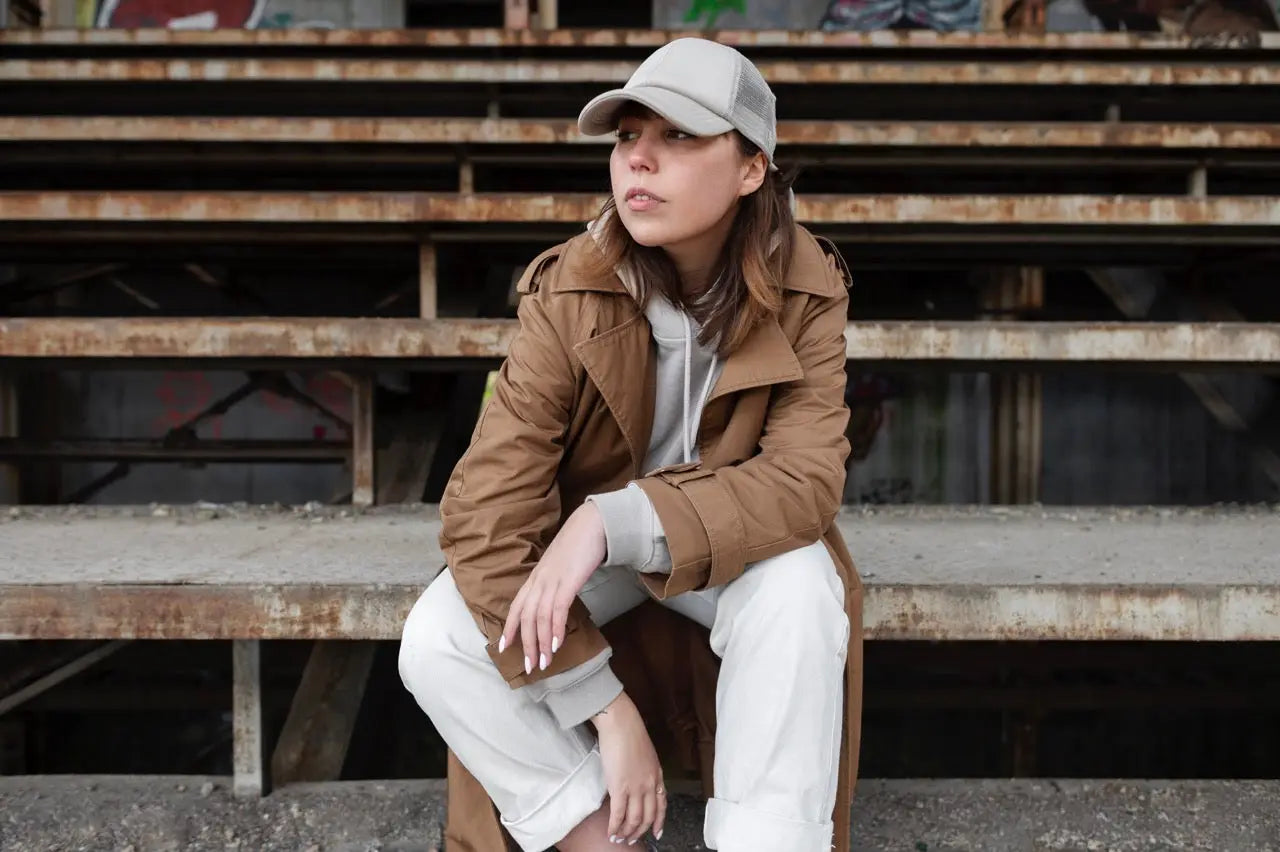 Woman in casual attire exploring different styles of caps for women