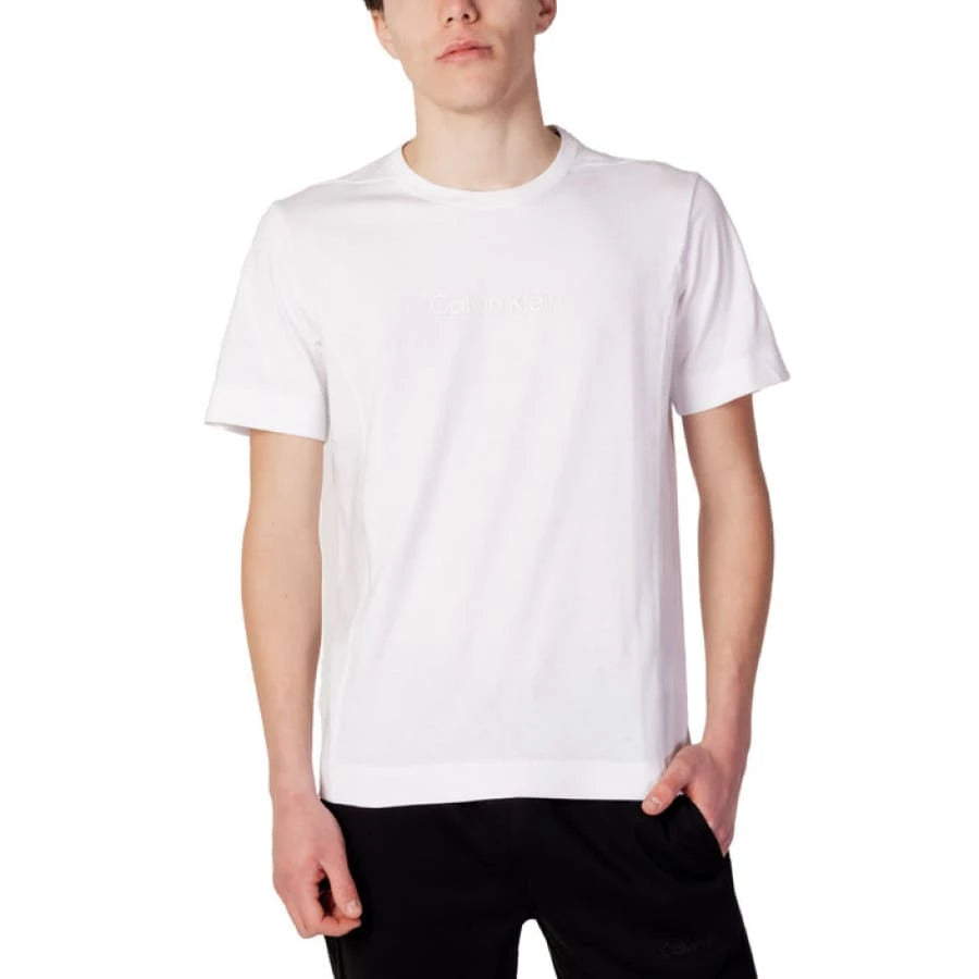 Man in Calvin Klein Performance white t-shirt