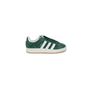 Green adidas gazelle sneakers with white stripes and suede upper.