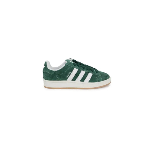 Green adidas gazelle sneakers with white stripes and suede upper.