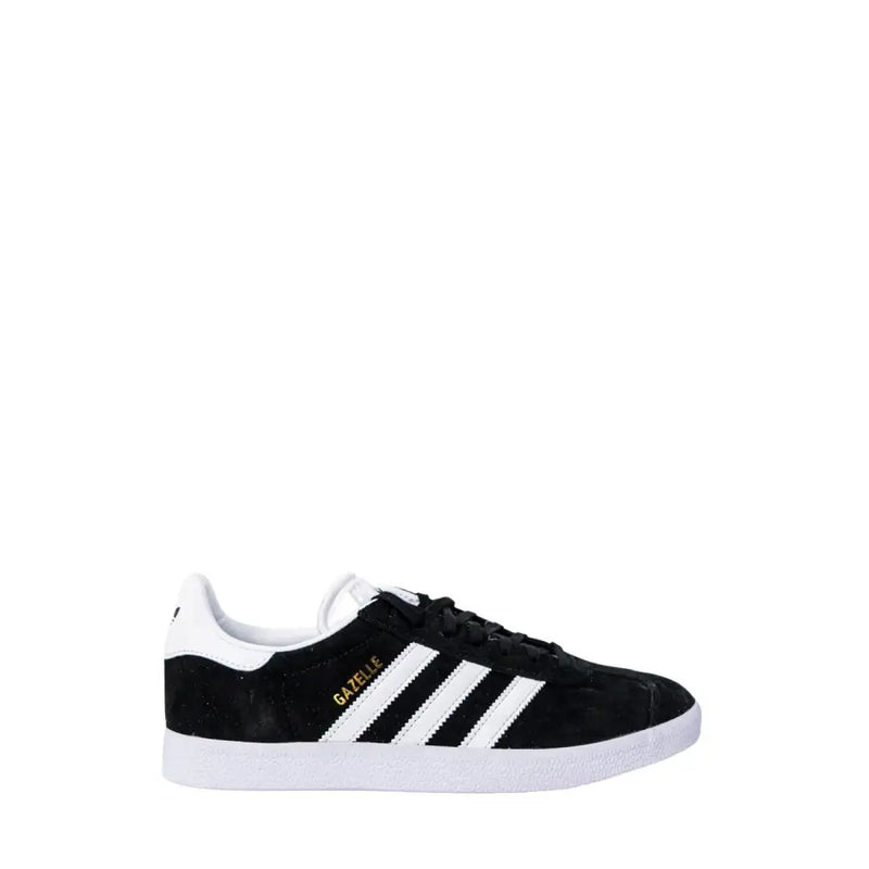 Black and white adidas gazelle sneakers with three stripes.