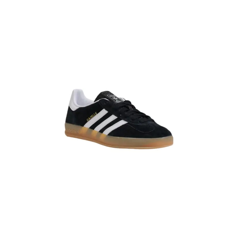 Black and white adidas samba indoor soccer shoe with gum sole.