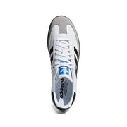 White adidas samba leather sneaker with black three stripes gray suede toe cap heel tab and blue adidas logo on tongue