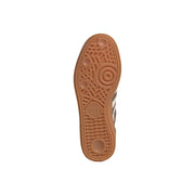 Tan rubber sole with textured pattern and adidas logo embossed near the heel of adidas originals men handball spezial sneakers