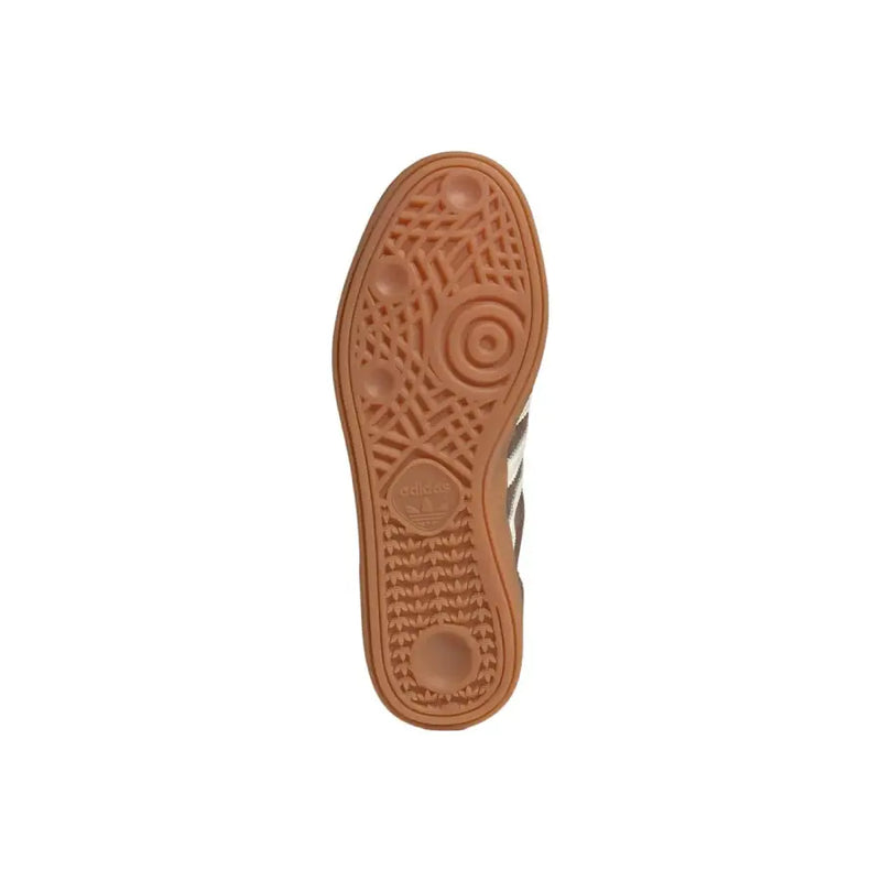 Tan rubber sole with textured pattern and adidas logo embossed near the heel of adidas originals men handball spezial sneakers
