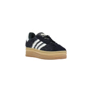 Adidas Baskets Originals pour femmes en cuir noir, daim bleu foncé à rayures blanches et semelle plateforme beige, idéales pour l'automne et l'hiver.