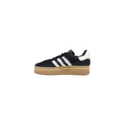 Adidas Baskets Originals pour femmes en cuir noir, à rayures blanches texturées et semelle plateforme beige, idéales pour l'automne et l'hiver.