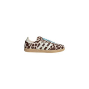Adidas Originals women brown leopard leather sneakers featuring brown and cream giraffe print with light blue laces