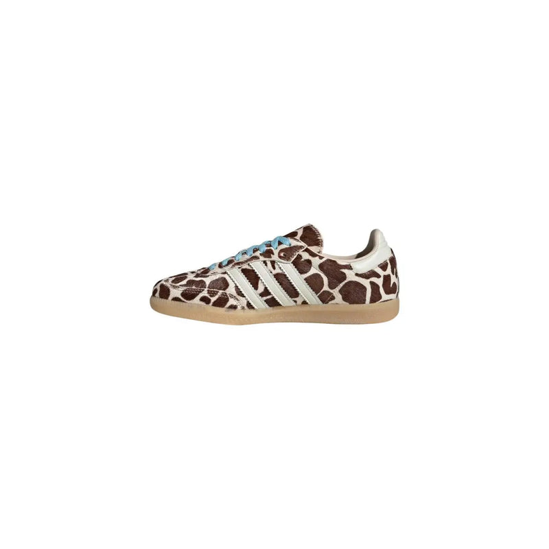 Adidas Originals women brown leopard leather sneakers with brown and cream giraffe print and light blue laces