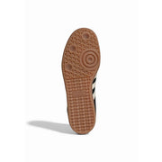 Adidas Originals women leather samba sneakers in black with tan textured rubber sole and three white stripes on the side
