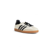 Cream-colored adidas samba leather sneakers with black stripes laces heel tab and gum rubber sole for women