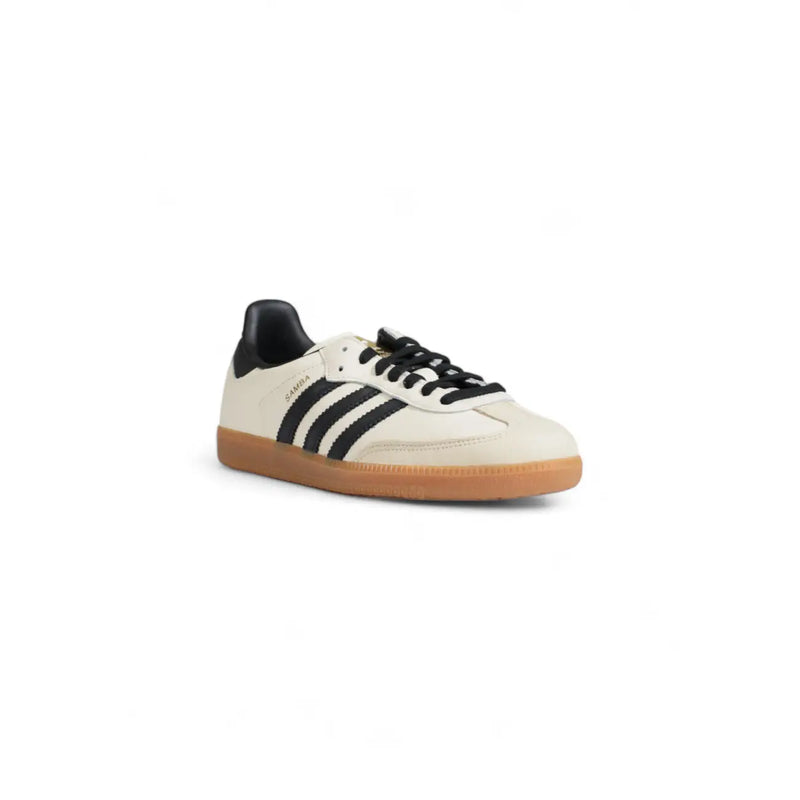 Cream-colored adidas samba leather sneakers with black stripes laces heel tab and gum rubber sole for women