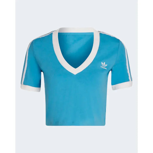 Adidas women’s light blue v-neck crop top with short sleeves and white trim on neckline sleeve cuffs and shoulders