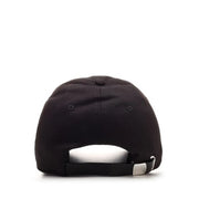 Back view of alexander mcqueen men cap black cotton baseball hat with white adjustable strap and silver buckle
