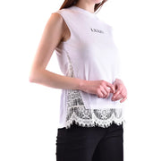 White sleeveless Alexander McQueen cotton tank top with delicate lace trim and lxxiv embroidery on the chest