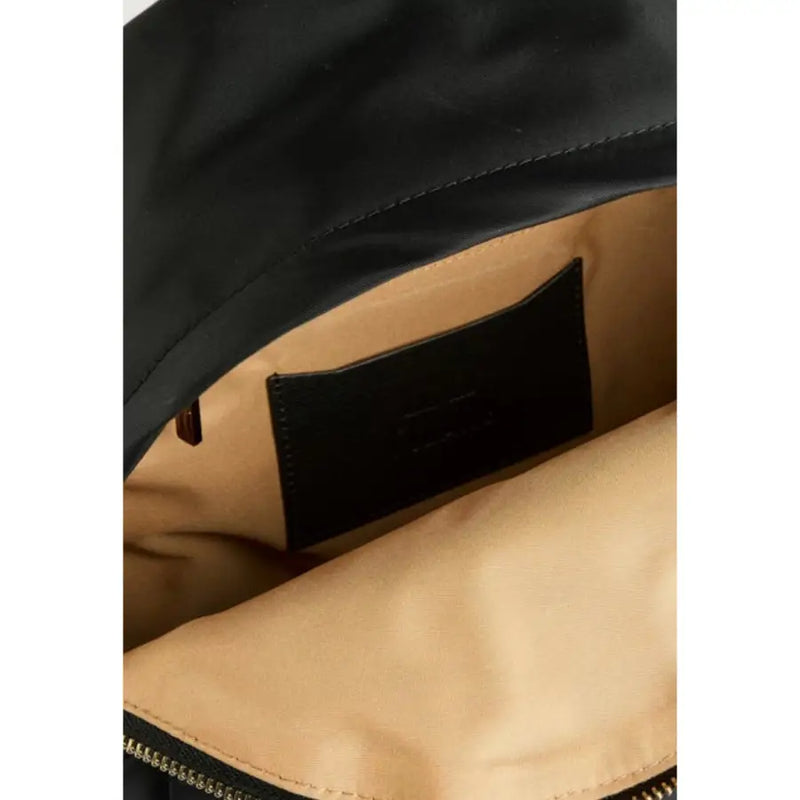 Alviero martini prima classe black rucksack interior with black nylon, tan lining, and a black leather patch