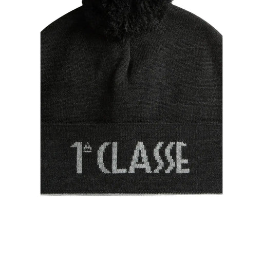 Black knit wool beanie by alviero martini with fuzzy pom-pom and white 1ère classe embroidery