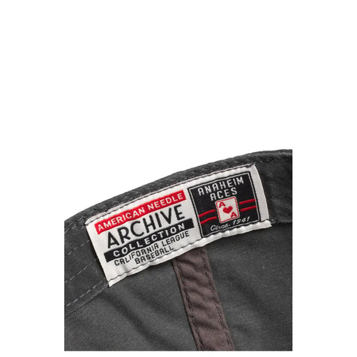 Dark gray cotton baseball cap for men featuring a white label with red and black text and anaheim aces logo