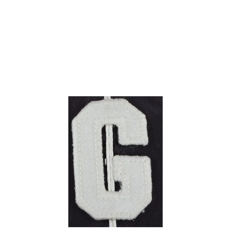 White embroidered letter g patch with textured frayed edge on American Needle men cap blue print cotton one size
