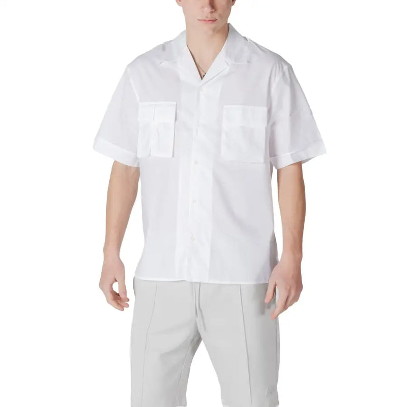 Men’s white short-sleeved collared shirt with two chest pockets displayed with Antony Morato Black Short Sleeve V Neck Shirt with Pockets