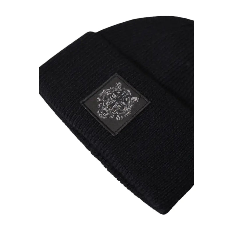 Black beanie with skull design on front