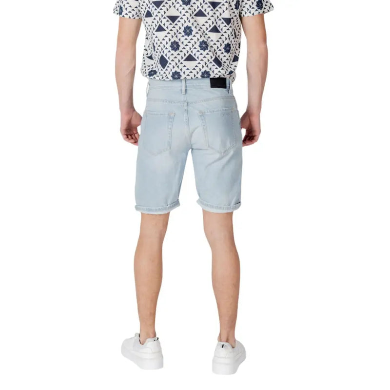 Antony Morato blue cotton shorts for men with light-wash denim, casual rolled hem, and classic back pockets shown from back
