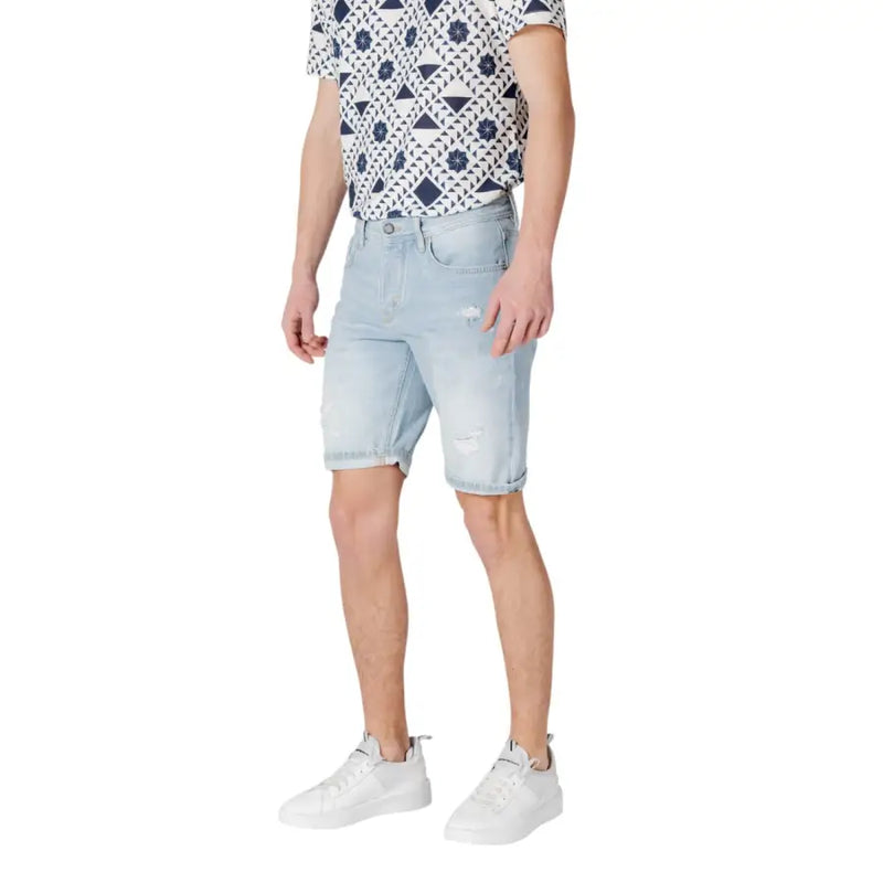Antony Morato blue cotton light-wash denim shorts for men with distressed details and rolled cuffs for spring summer