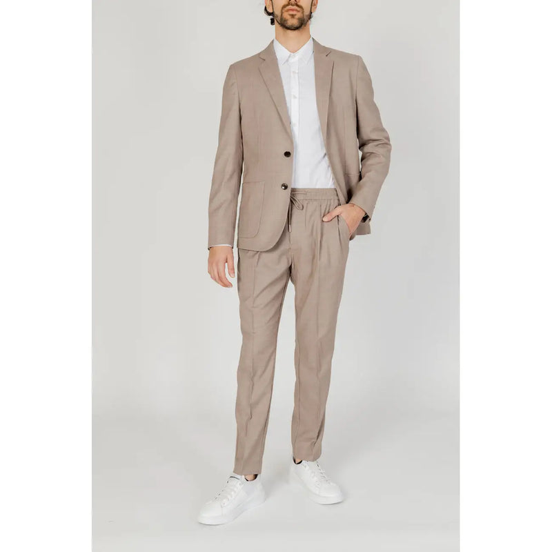 A tailored antony morato men beige viscose blend blazer jacket and matching textured trousers with drawstring waistband