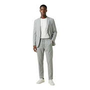 Antony Morato men blazer in a sleek light gray tailored suit with matching drawstring waistband pants and white sneakers