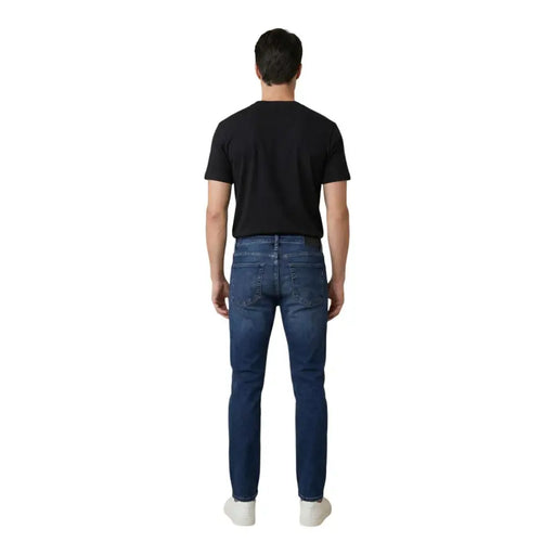Antony morato Ozzy Herren-Jeans aus blauer Baumwolle mit schmal zulaufendem Schnitt, von hinten gesehen, mit dunkelblauem Slim-Fit-Denim und klassischen Taschen