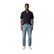A pair of light-wash distressed denim jeans with ripped knees and thighs for men by Antony Morato