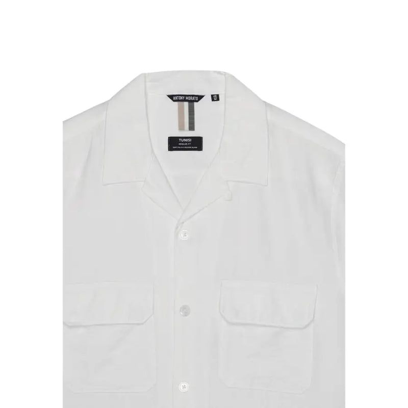 White cotton button-down men shirt with two front pockets and collar featuring antony morato brand label inside