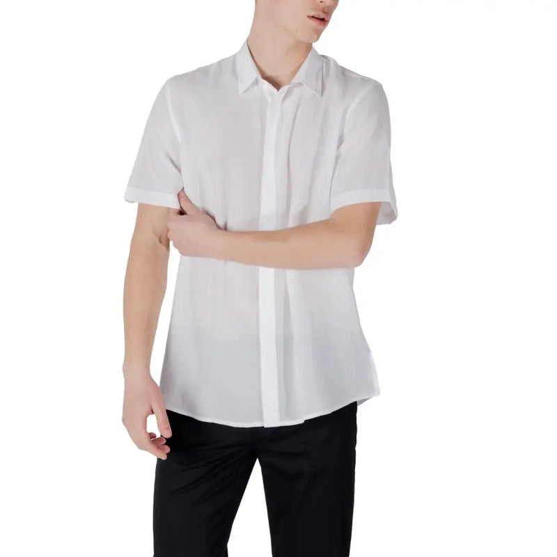 White short-sleeved button-down shirt by antony morato featuring a crisp collar and subtle front pleats for men