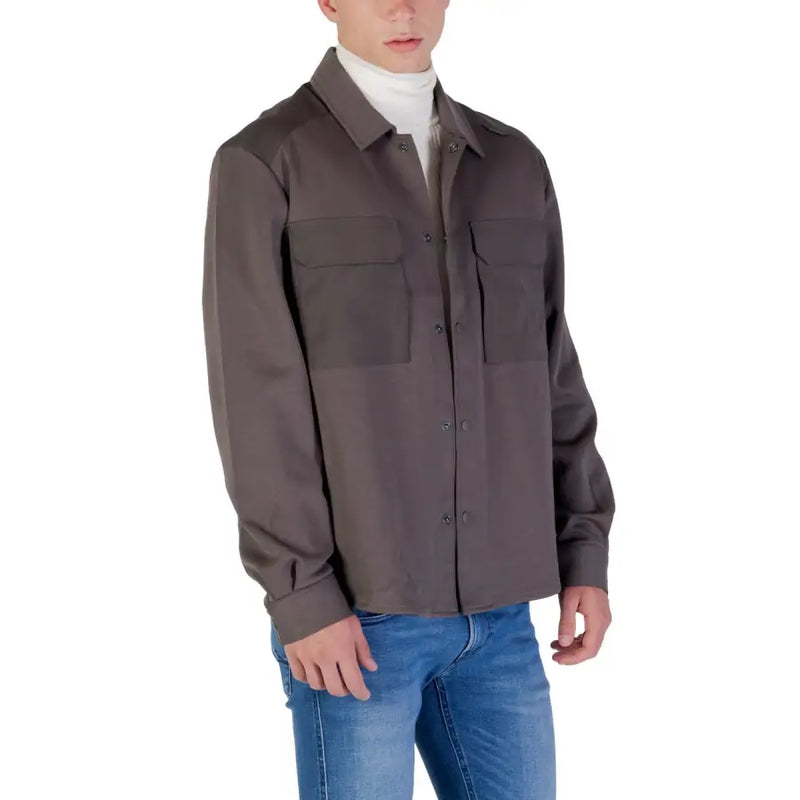 Antony Morato men shirt in dark gray with two chest pockets and collar, ideal for casual and formal wear