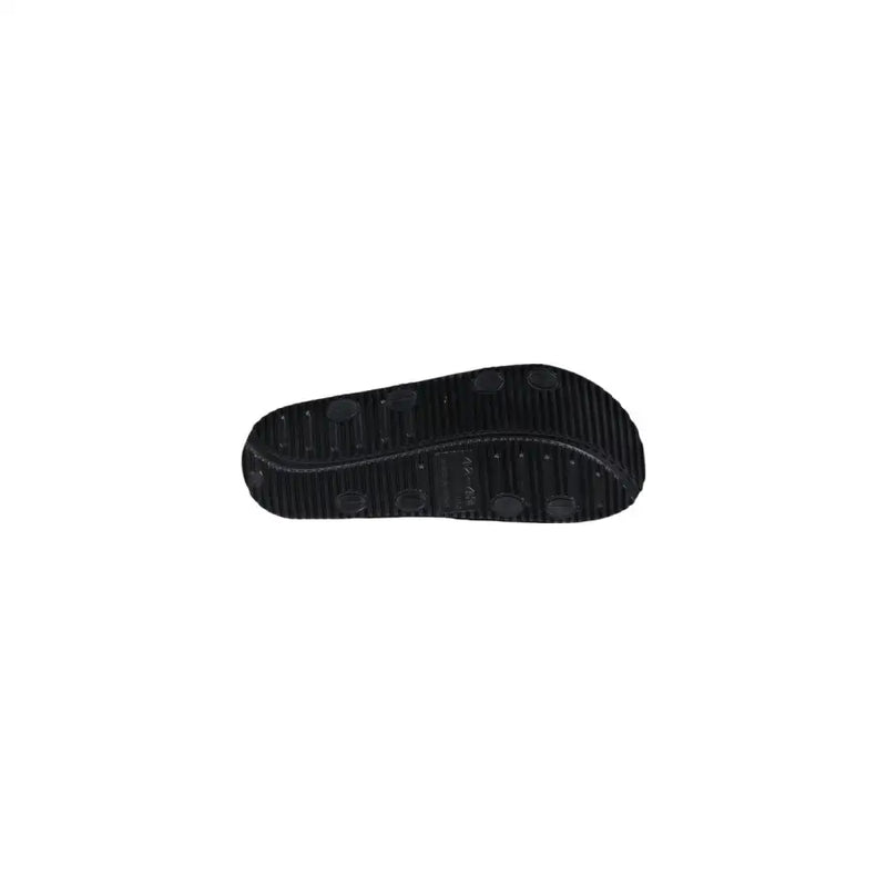 Black rubber sole with textured grip pattern and circular indentations of antony morato men slipper kry black sandals