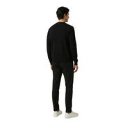 Antony Morato men trousers paired with a black crewneck sweater featuring long sleeves and a smooth fitted silhouette
