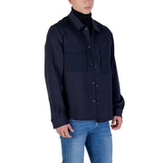 Men’s navy blue long-sleeve button-up shirt with chest pockets for fall winter style