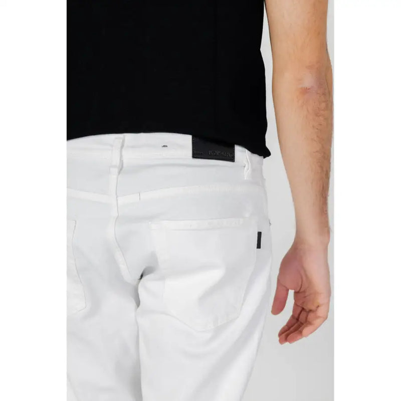 Antony morato men’s white denim jeans with pockets and black leather brand patch on the back waistband