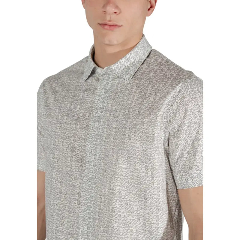 Men’s beige short-sleeved button-down shirt with subtle geometric pattern by Armani Exchange