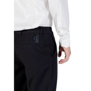 Black tailored armani exchange fall winter trousers with zip and button pockets showing back waistband logo patch