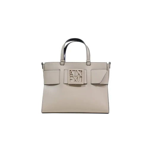 Armani Exchange beige leather handbag with black handles and logo plaque