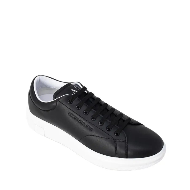 Armani Exchange black leather low-top sneakers for men with white rubber sole and black laces featuring logo side detail