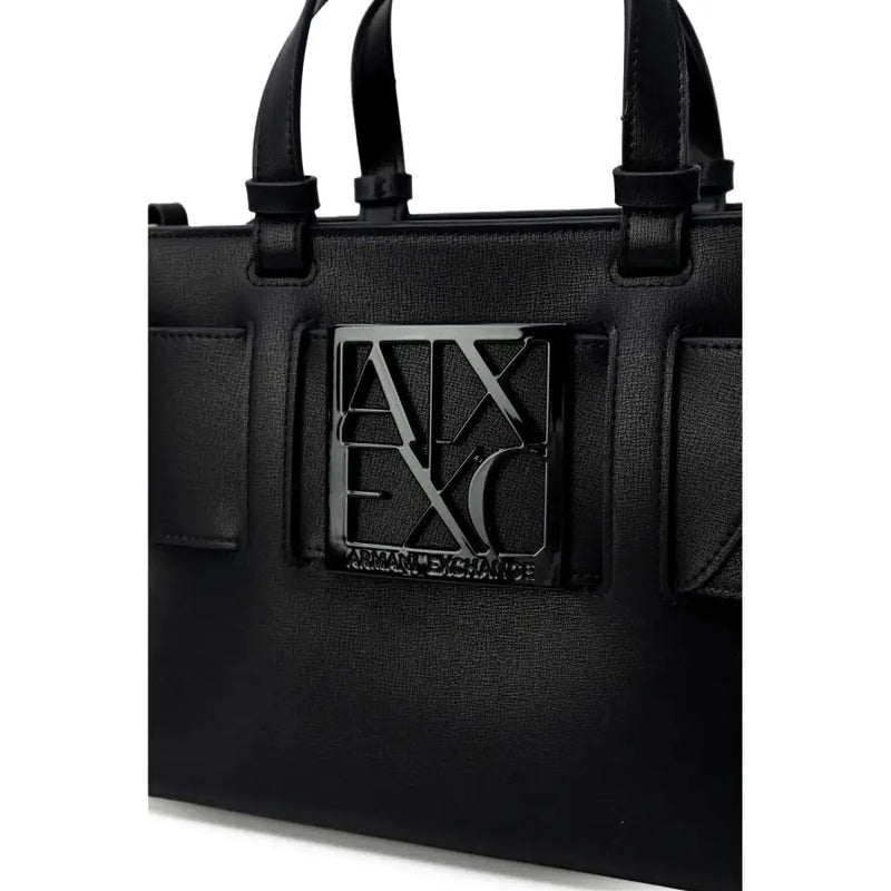 Black Armani Exchange tote bag in textured polyurethane with shoulder strap and prominent metallic logo plaque
