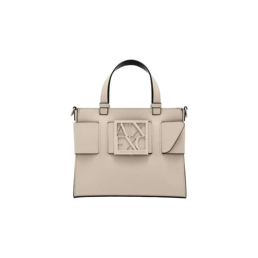 Armani Exchange beige leather handbag with black handles and axe logo plaque