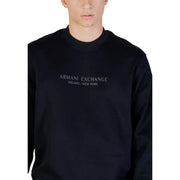 Black armani exchange long-sleeved sweatshirt with subtle gray embroidered branding made from 100% cotton for fall winter use
