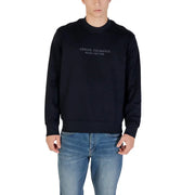 Men’s dark blue Armani Exchange cotton crewneck sweatshirt with light wash jeans