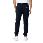 Men’s navy blue cotton joggers with white sneakers from Armani Exchange for fall winter fashion