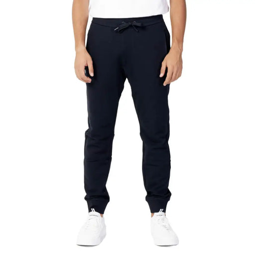 Men’s navy blue cotton sweatpants with drawstring waist and ribbed cuffs for Fall Winter Armani Exchange collection